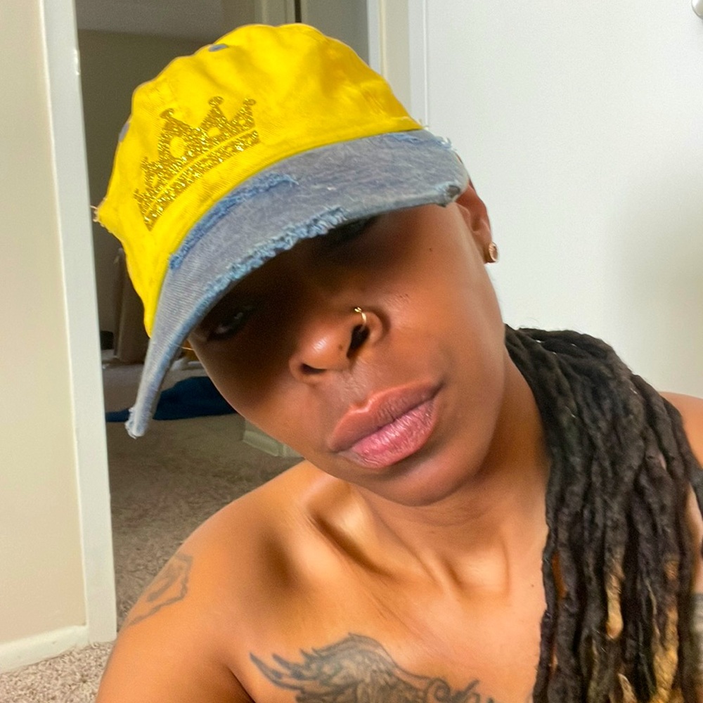 Yellow royalty dad hat with blue brim distressed